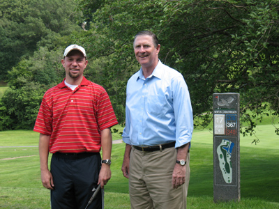 Lisle with golfer at the Newton Commonwealth Golf Course